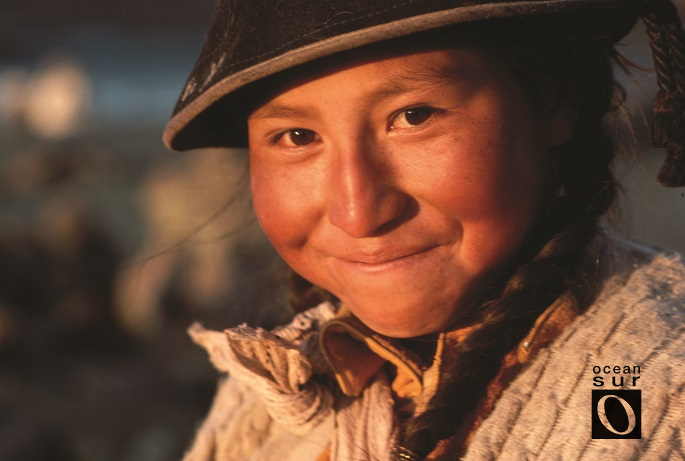 Rostro sonriente de una pastora peruana.